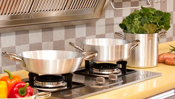 KRSNA aluminium cookware on a gas hob