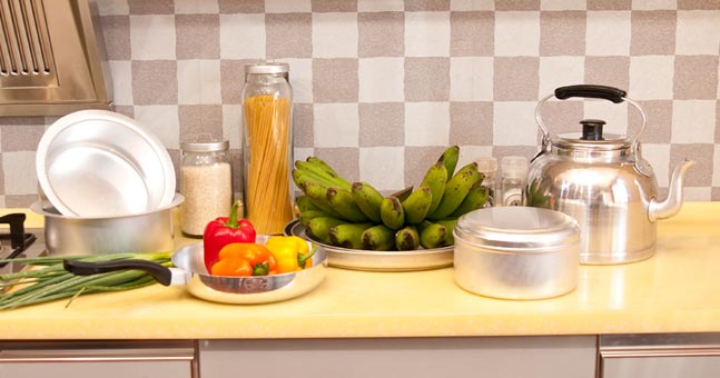KRSNA pans, canisters and kettle in a kitchen